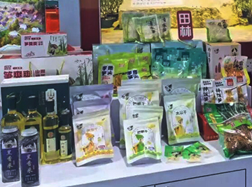 田林好物“八洞黑香米”在东盟博览会旅游展区受热捧